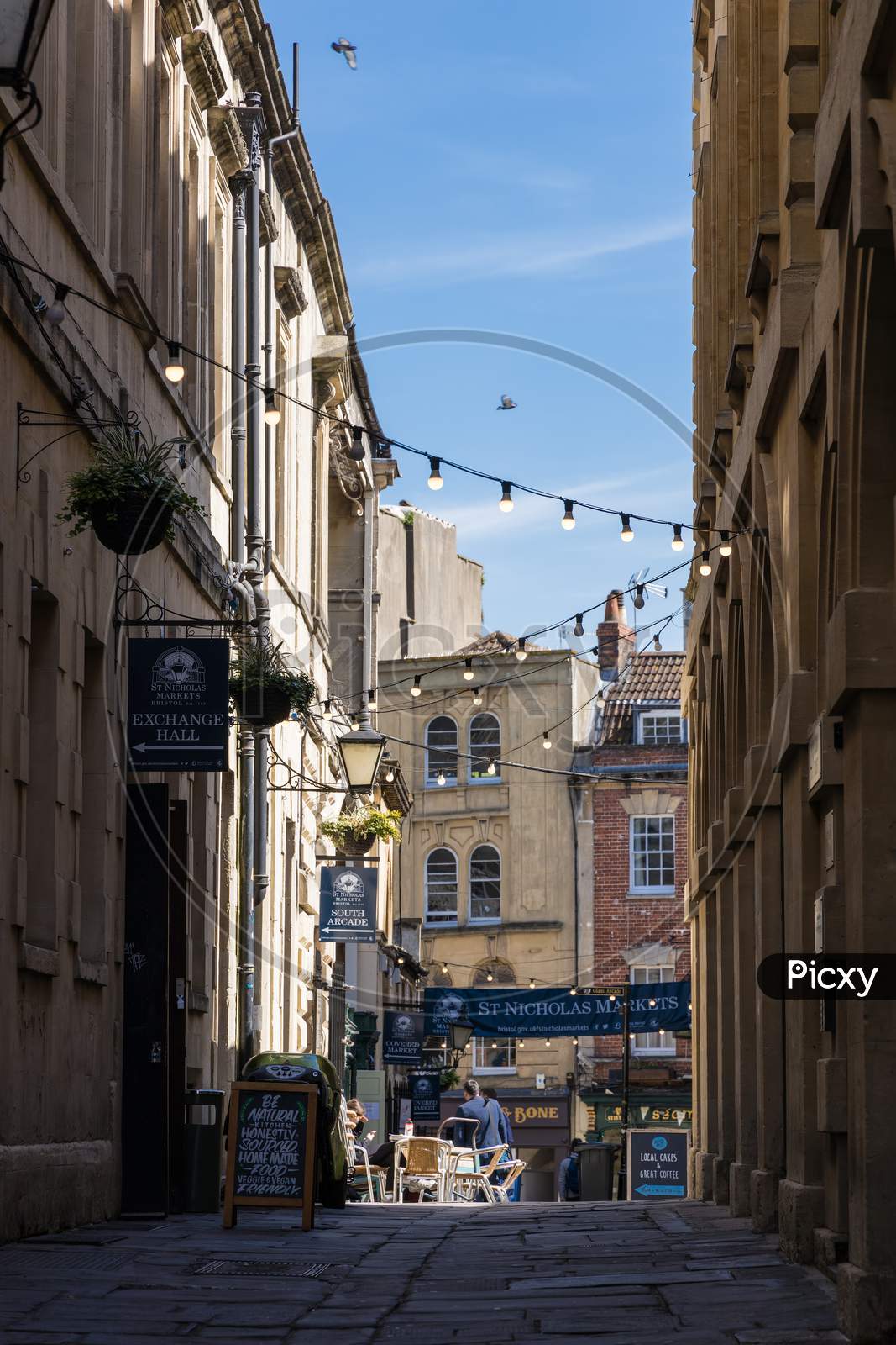 Bristol, Uk - May 14 : View Towards St Nicholas Market Buildings In Bristol On May 14, 2019. Unidentified People