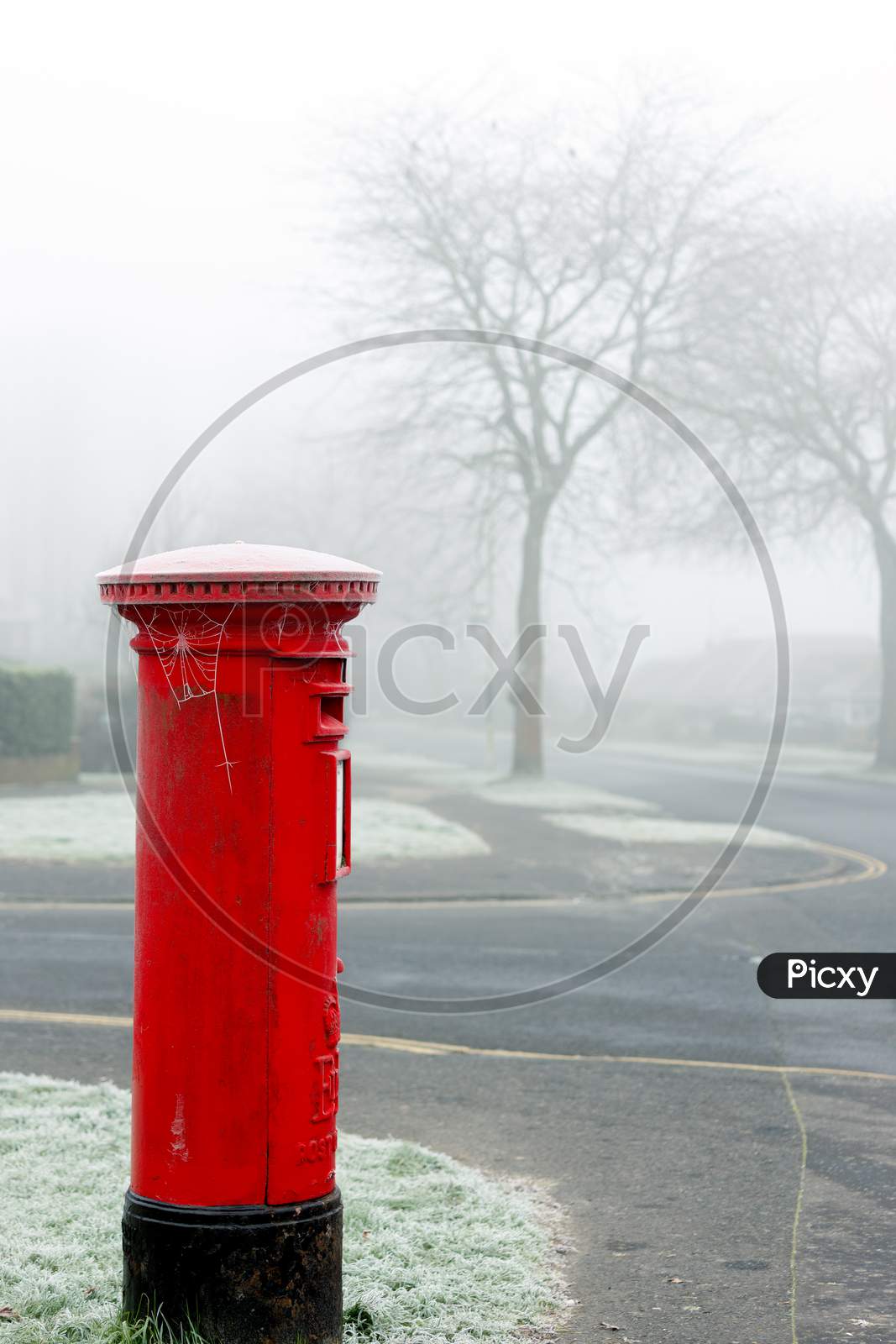 East Grinstead, West Sussex, Uk - January 10 : Hoar Frost On A Red Pillar Box In East Grinstead, West Sussex On January 10, 2021