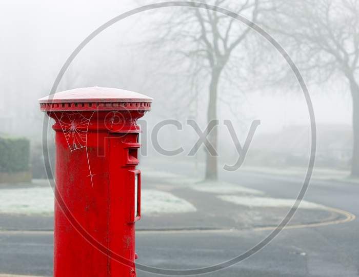 East Grinstead, West Sussex, Uk - January 10 : Hoar Frost On A Red Pillar Box In East Grinstead, West Sussex On January 10, 2021