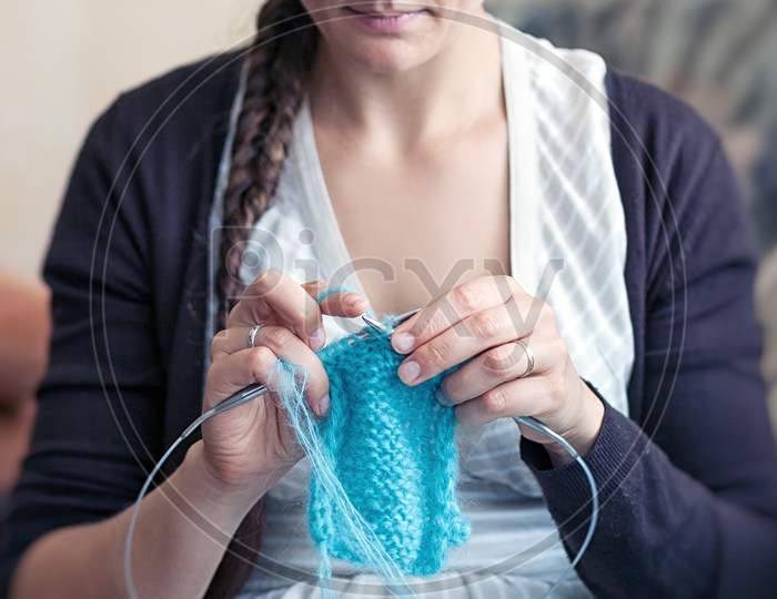 Young Woman Knits