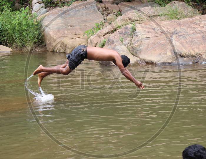 person diving in the water