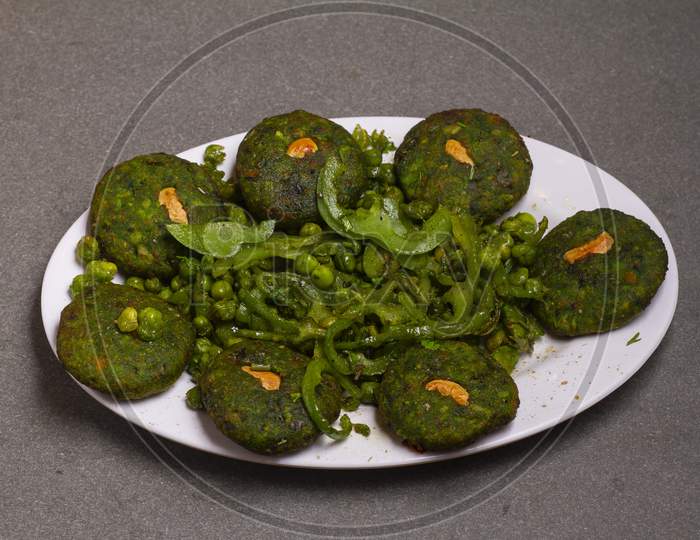 Hara Bhara Kabab Or Kebab Is An Indian Vegetarian Snack Recipe That Is Served With Green Mint Cutney On A Moody Background. Selective Focus