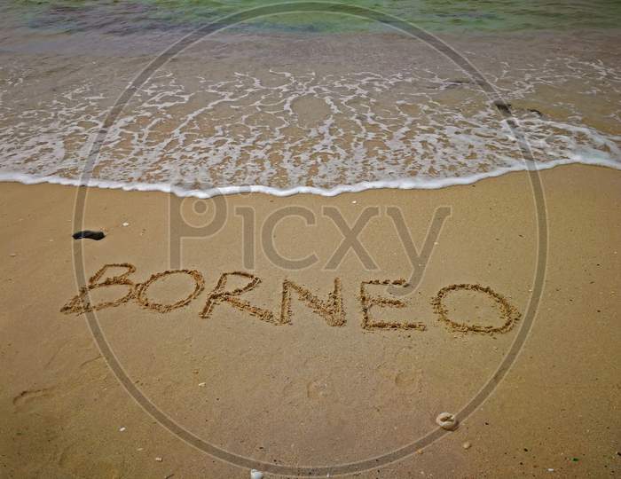 Borneo text written on sandy beach, Kota Kinabalu, Borneo, Sabah, Malaysia