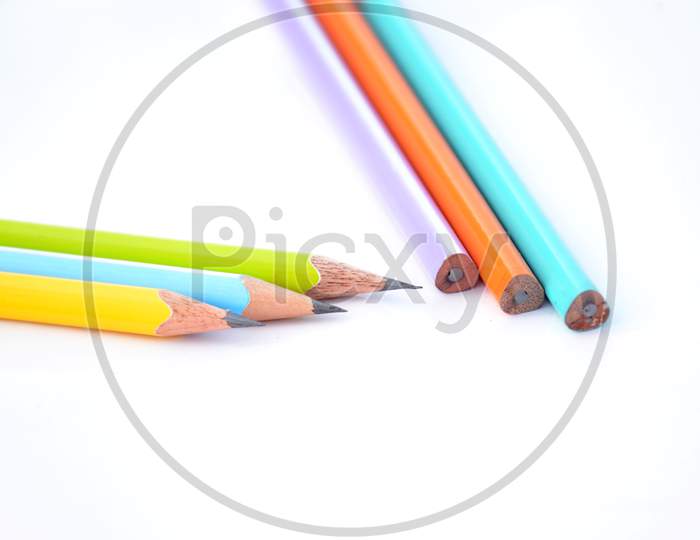 Bunch The Colorful Wooden Peels Pencils Isolated On White Background.