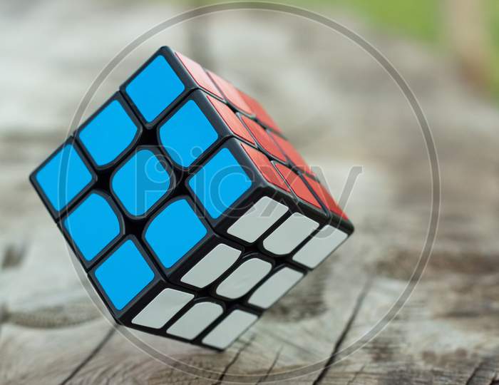 3 by 3 Rubik cube selective focus photography