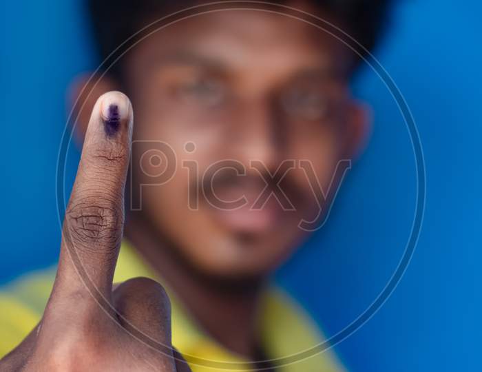 Chennai, India - 5Th March 2021: Indian Voter Showing His Hand With Voting Sign And Ink Pointing Vote For India.