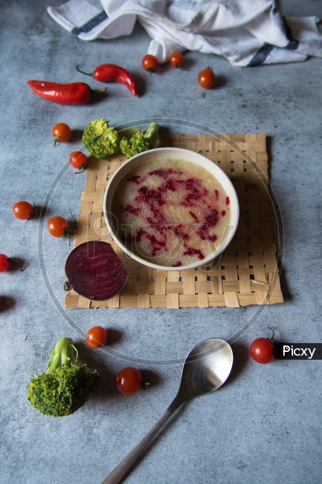 Healthy food ingredient chicken soup prepared with white oil and beetroot