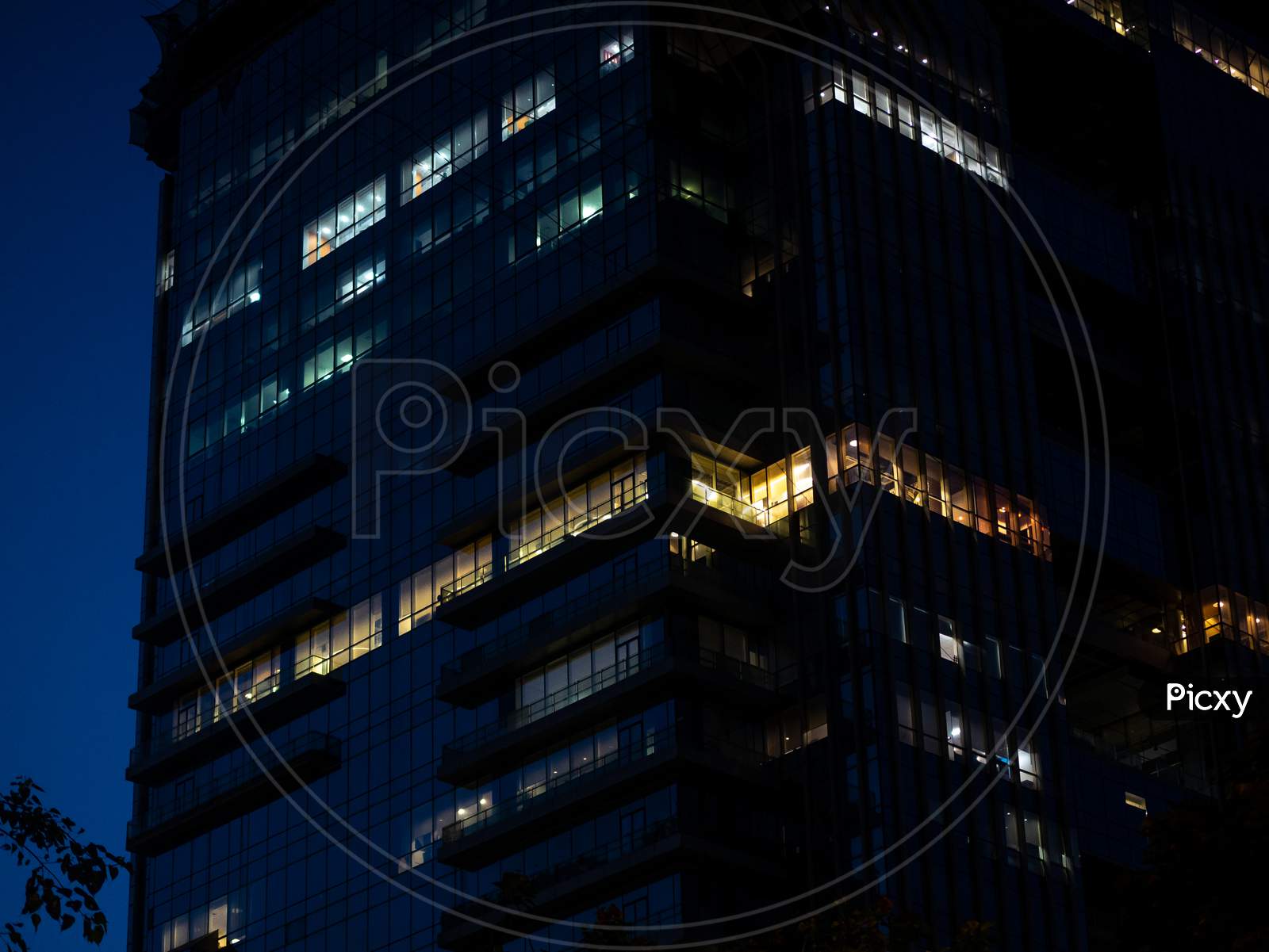 Business Office Building Illuminated In The Evening