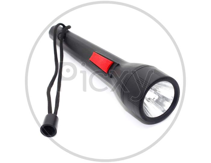 Black Electric Led Torch Flashlight Isolated On A White Background