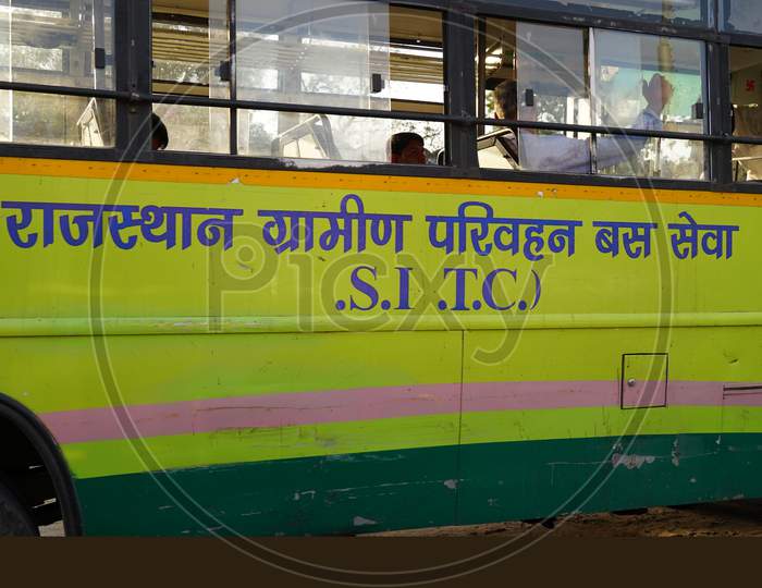 Sign Or Logo Of Rsrtc Bus In India. Bus Services Side View Shot With Light Green Color.