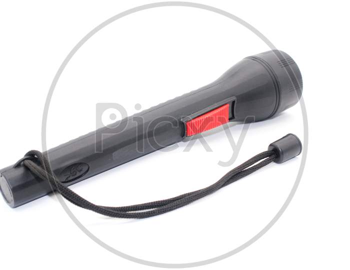 Black Electric Led Torch Flashlight Isolated On A White Background