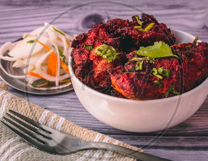 Deep Fired Chicken Known As Chicken 65 In South India. Spicy Fried Chicken With Relish