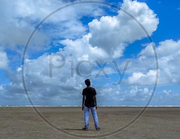 A man standing in a beach