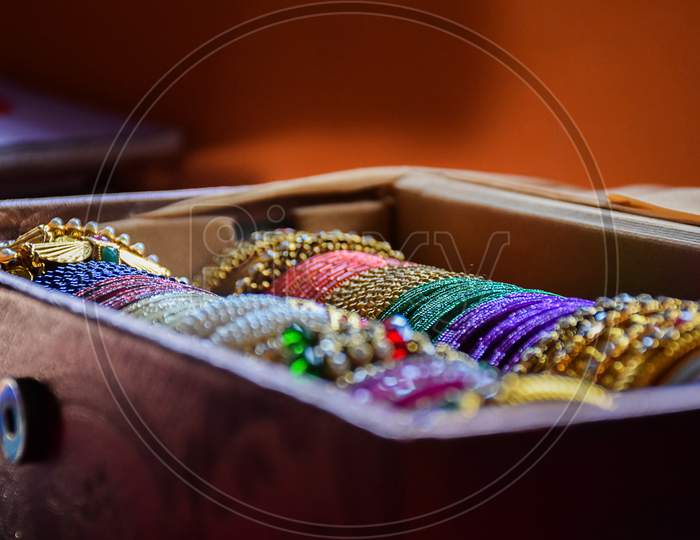 Stock Photo Of Indian Traditional Colorful Bangles And Bracelet Kept And Decorated In Bangle Box On Blur Background, Focus On Object At Bangalore Karnataka India.