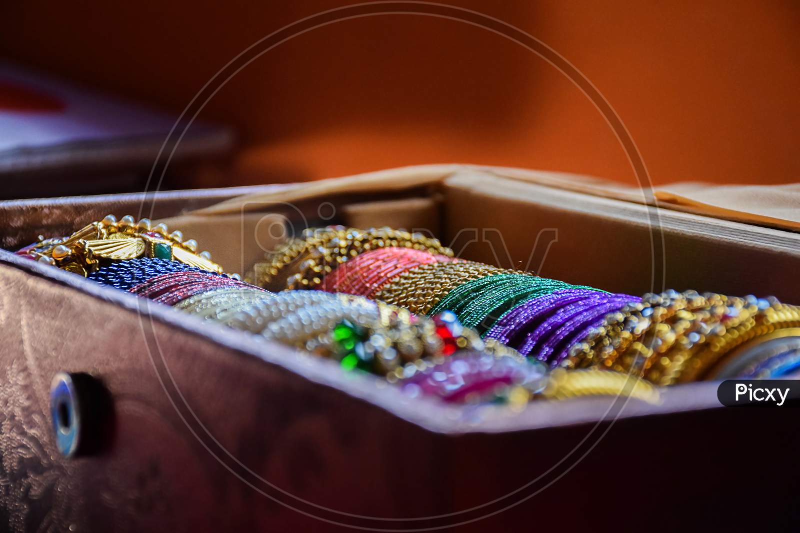 Stock Photo Of Indian Traditional Colorful Bangles And Bracelet Kept And Decorated In Bangle Box On Blur Background, Focus On Object At Bangalore Karnataka India.