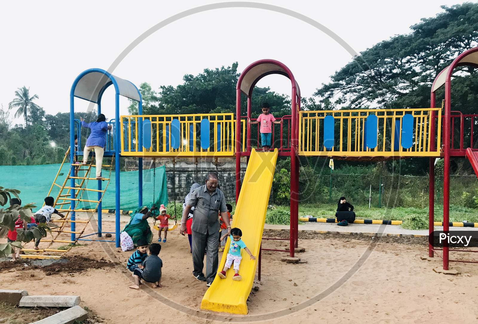 Children playing and enjoying on a slides