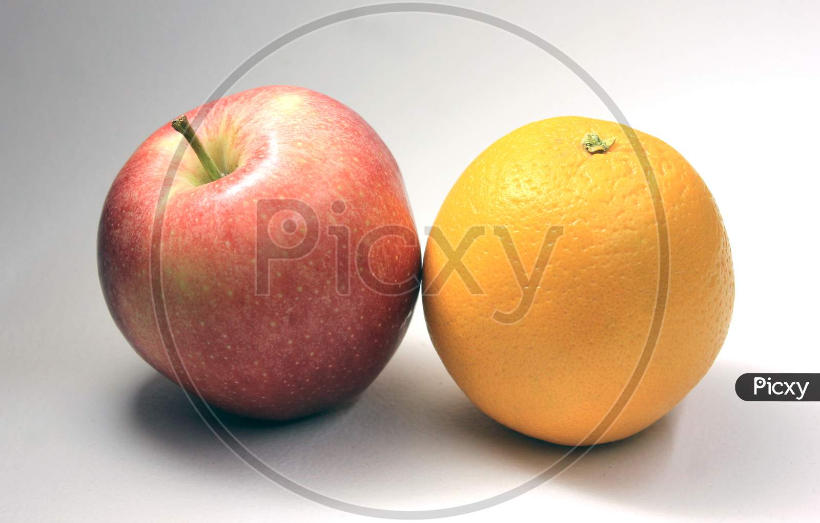 An Apple And An Orange Fruit