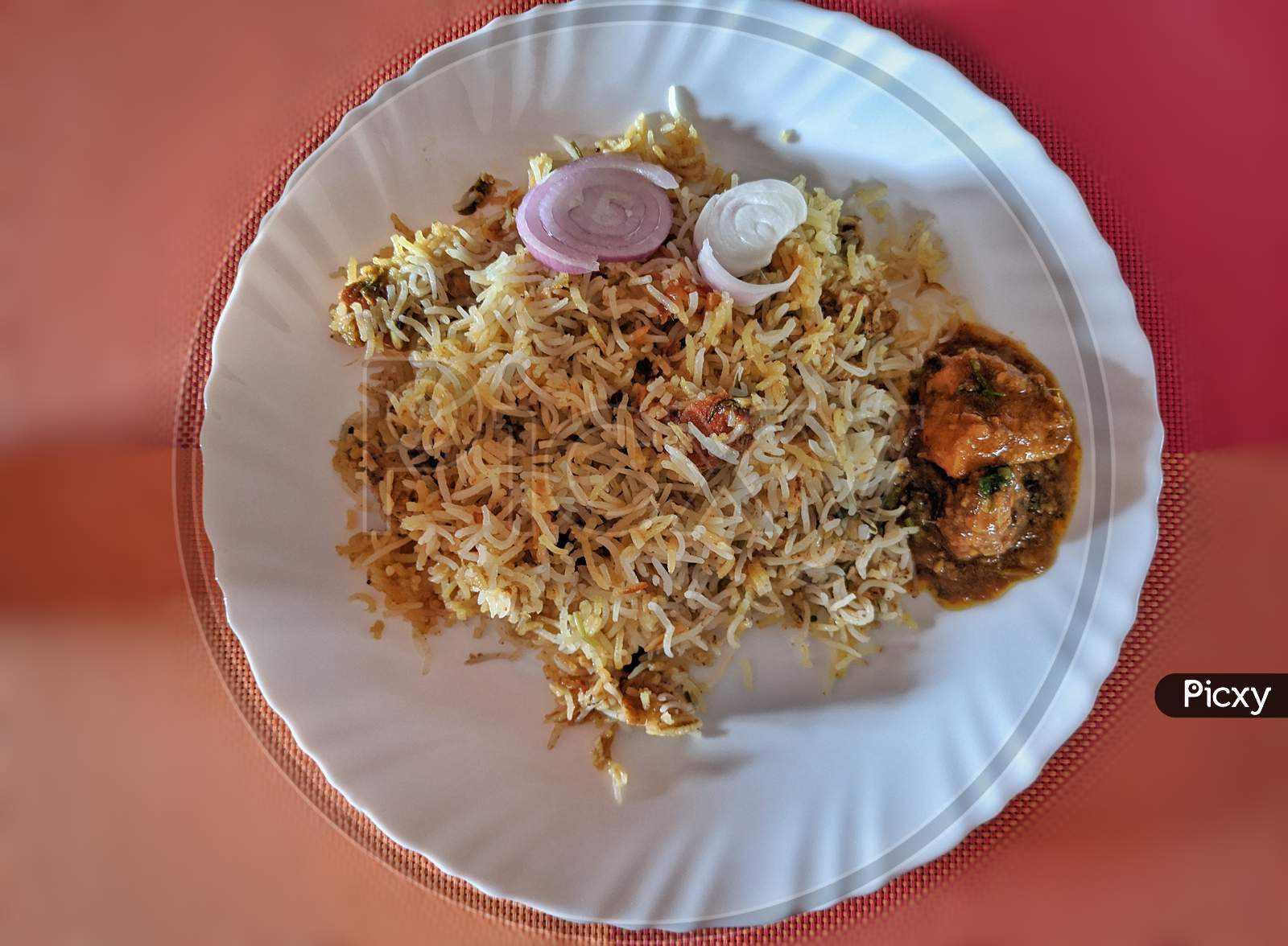 Chicken Biryani Traditional Vegetables Sauce Rice Cafe Indian Cuisine Restaurant Top View With Colorful Background