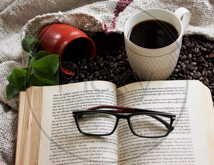 A Book A Coffee And Coffee Beans
