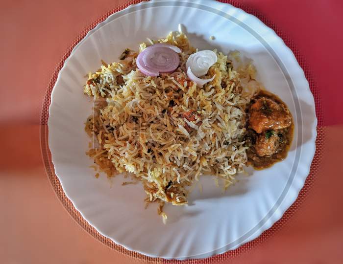 Chicken Biryani Traditional Vegetables Sauce Rice Cafe Indian Cuisine Restaurant Top View With Colorful Background