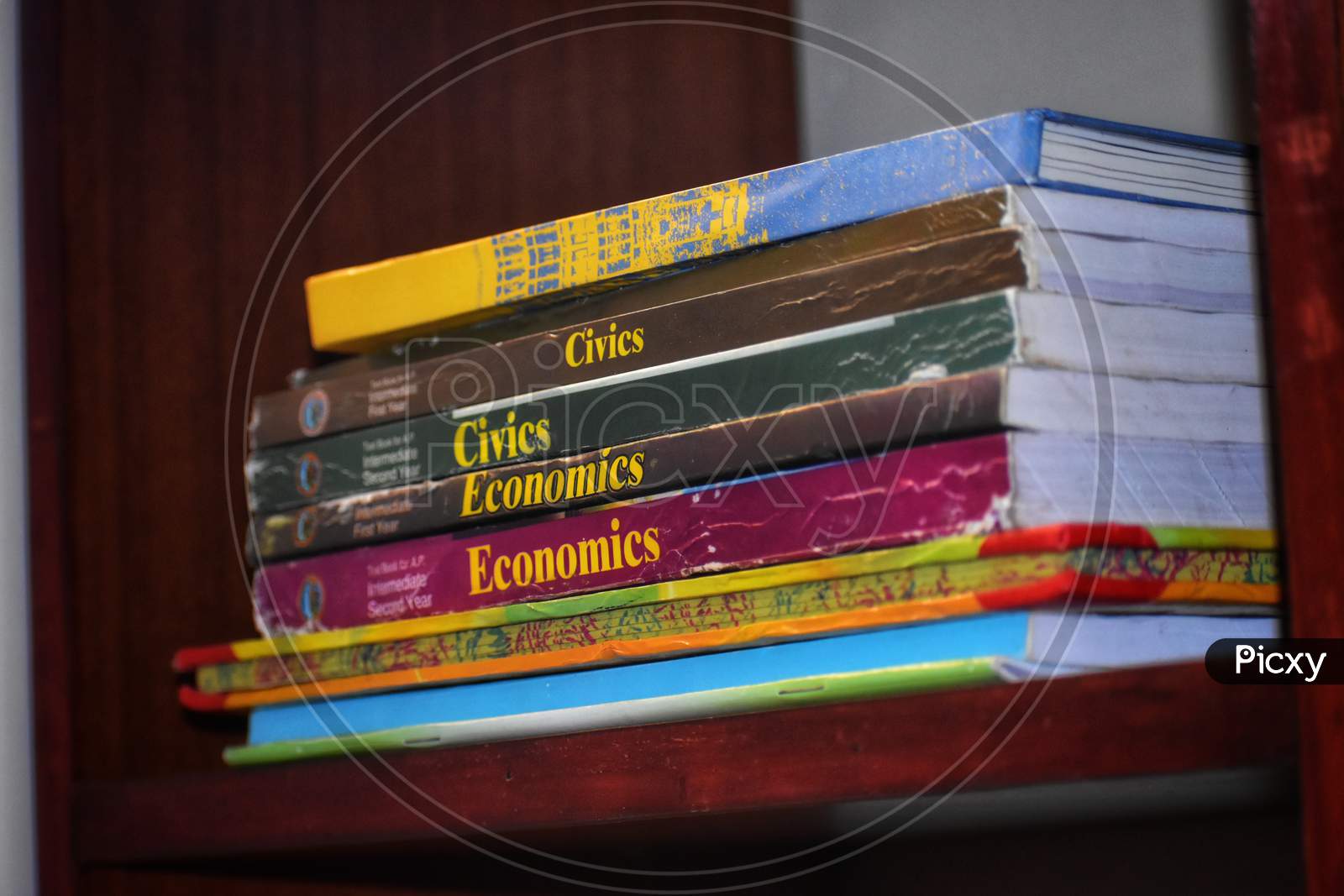 Many Books Piles. Hardback Books On Wooden Table. Back To School. Copy Space, Civies, Economics, India