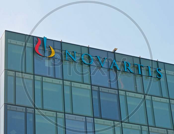 Novartis Sign Hanging At The Building In Rotkreuz, Switzerland
