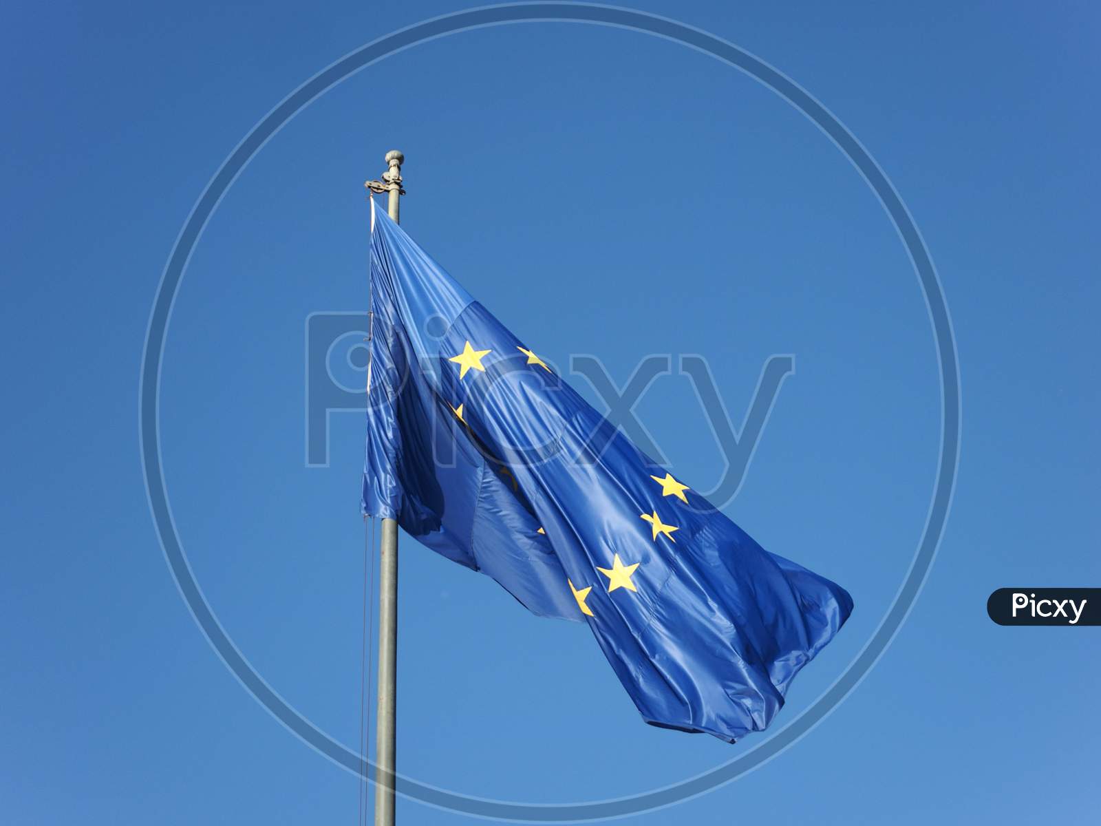 Flag Of The European Union (Eu) Over Blue Sky