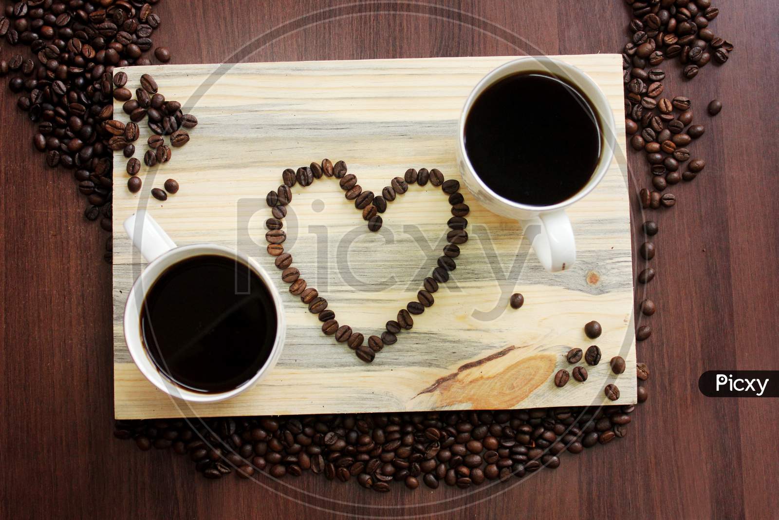 Coffee Beans With A Heart Symbol Stock Photo