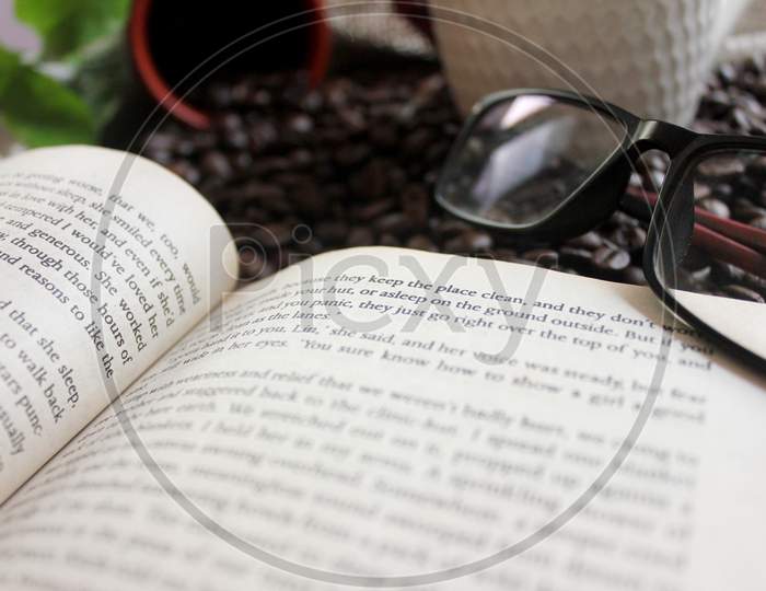 A Book And Coffee Beans