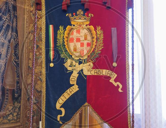 Cagliari, Italy - Circa September 2017: Flag Of The Town At Palazzo Civico (Meaning Town Hall) Aka Palazzo Bacaredda