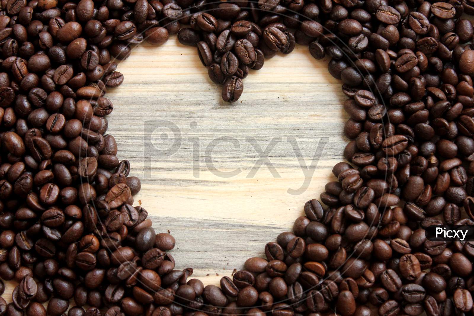 Coffee Beans With A Heart Stock Photo