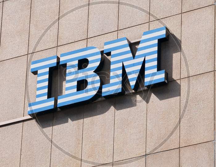 Ibm Company Sign Hanging On A Building In Lugano