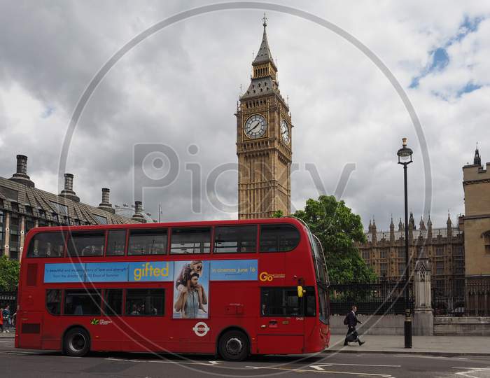 London, Uk - Circa June 2017: Red Double Decker Bus Public Transport In Front Of The Houses Of Parliament