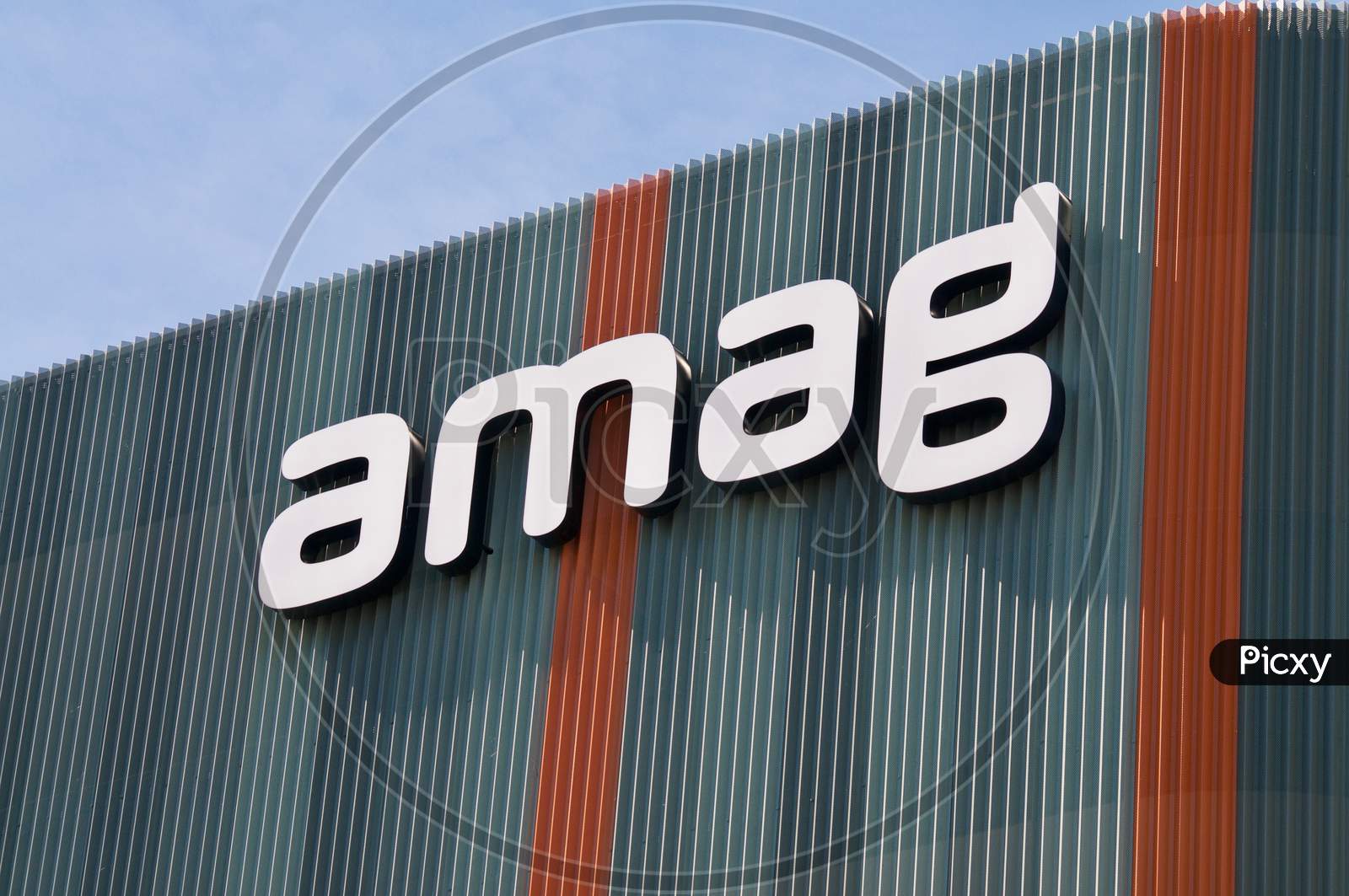 Amag Group Sign Hanging At Headquarters Building In Cham, Switzerland