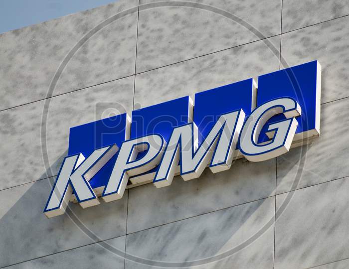 Kpmg Sign Hanging On A Building In Lugano, Switzerland