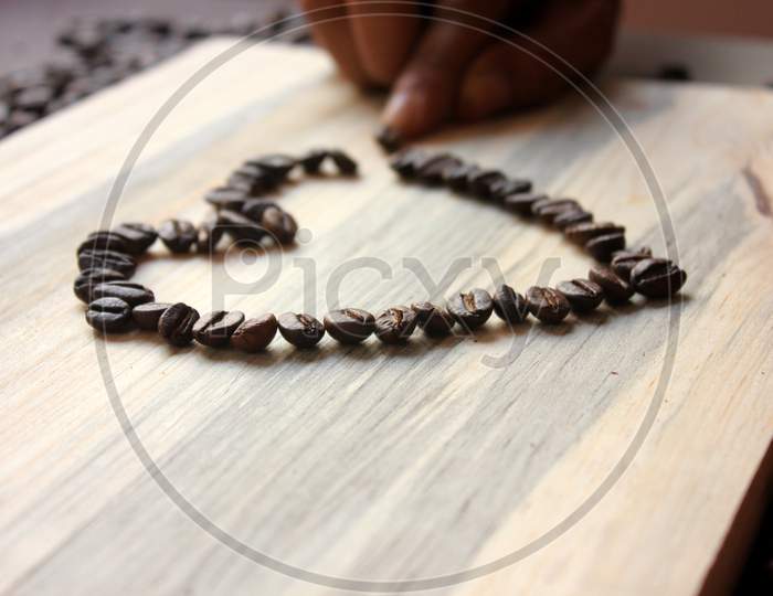 Coffee Beans With A Heart Stock Photo