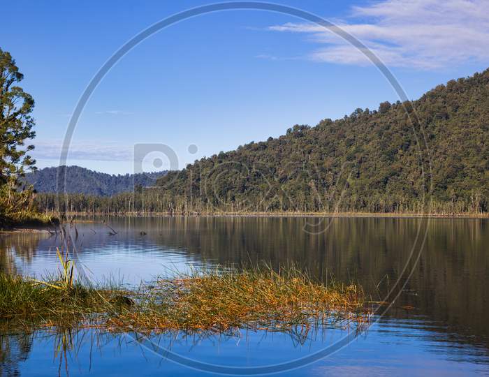 Scenic View Of Lake Mahinapua In New Zealnad