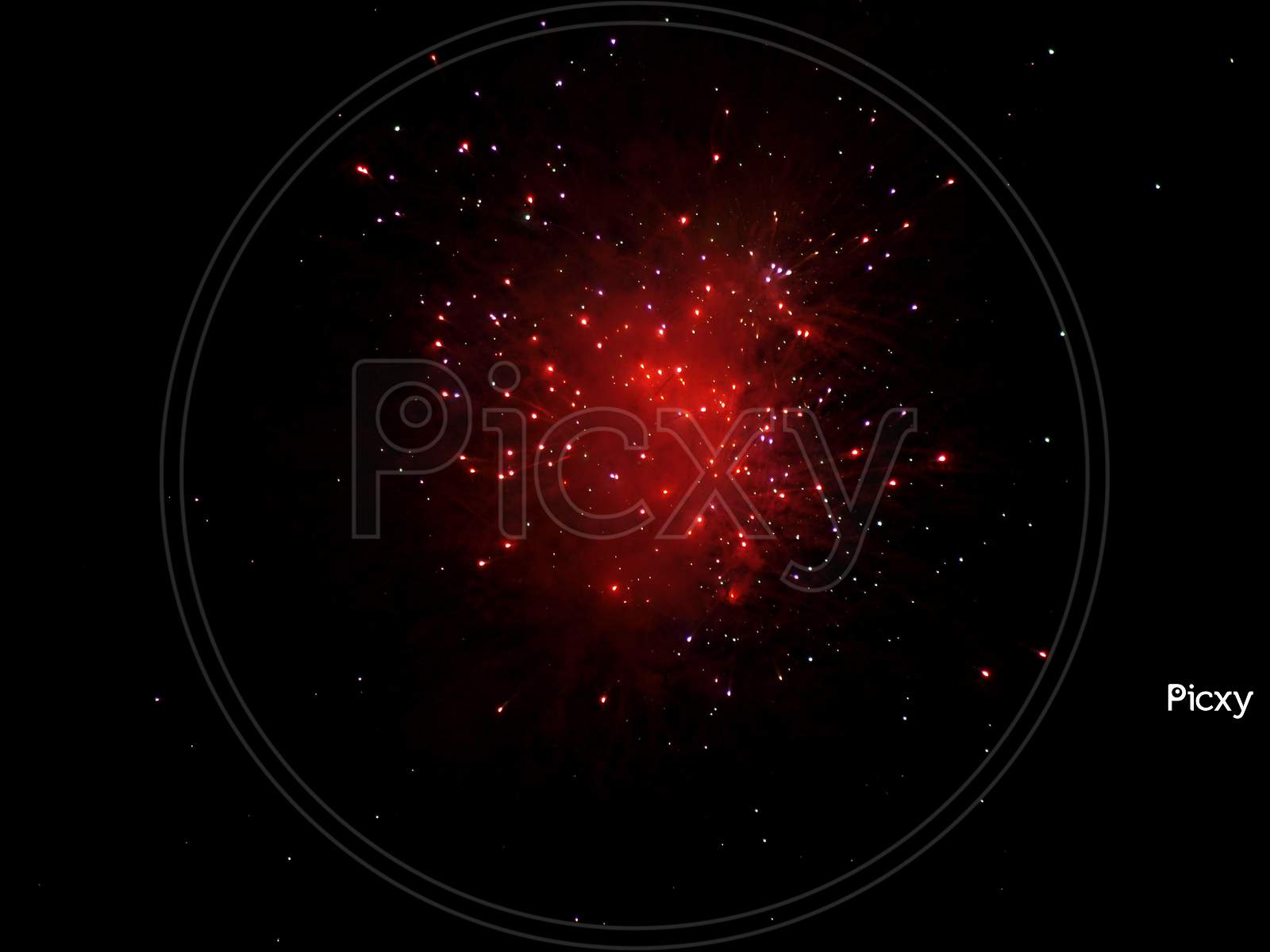 Red Fireworks Over Black Sky