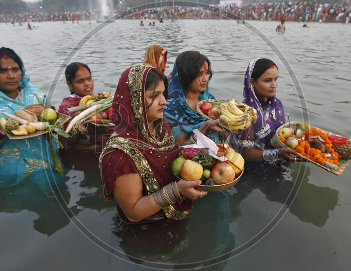 Hindu Devotees Offer Prayers To The Sun God During The Hindu Religious Festival Chhat Puja In Chandigarh