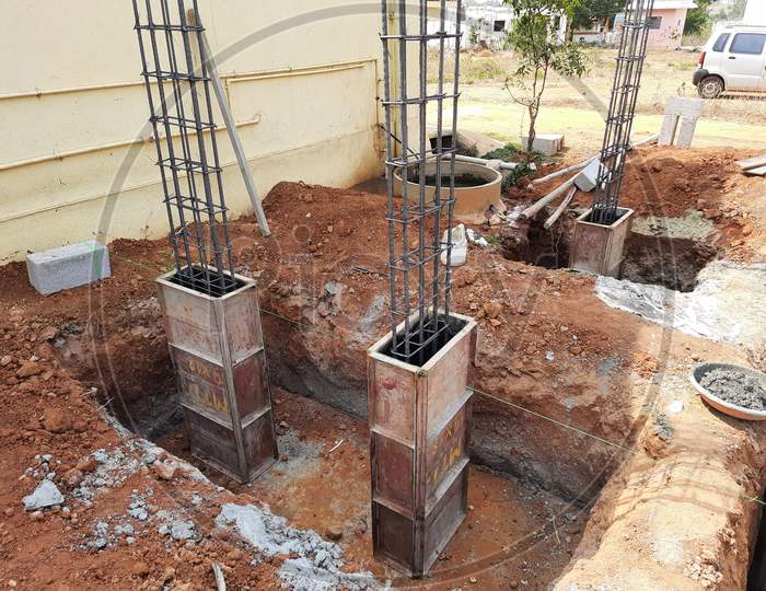 Closeup of construction of building Indian house with pillar, beam, pit and water sump construct using cement block