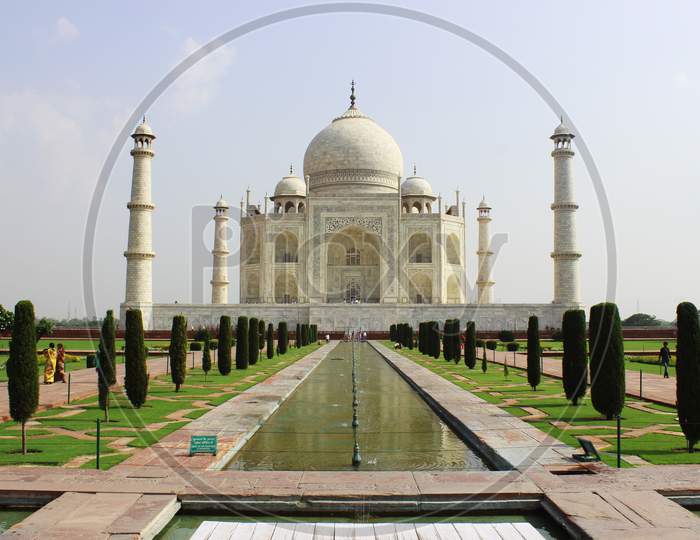 Beautiful Taj Mahal with water pond in the afternoon.