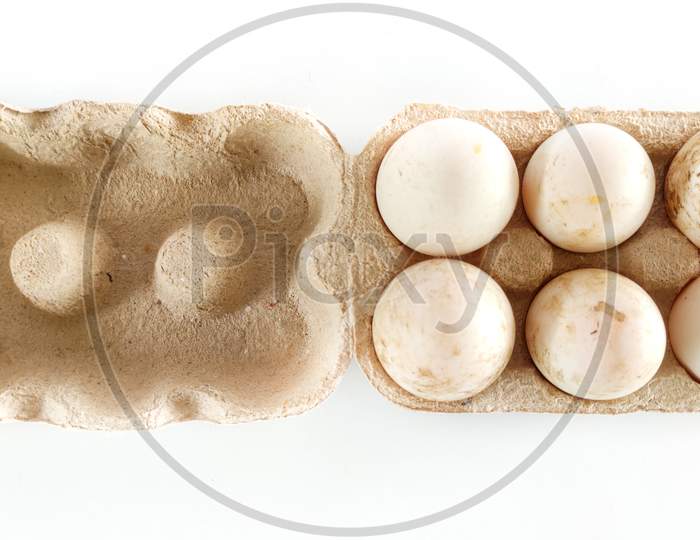 Top View Of Duck Eggs In A Container