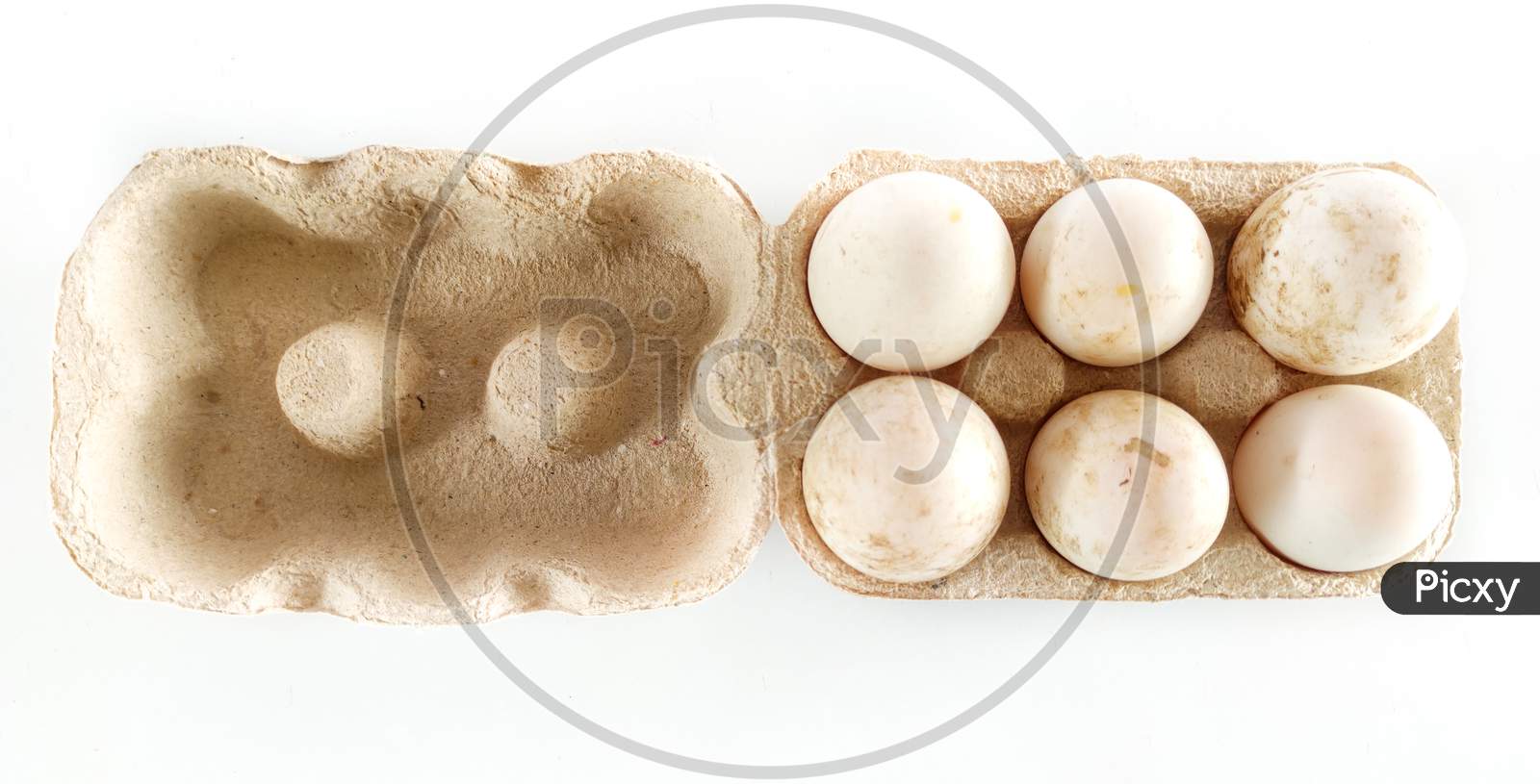 Top View Of Duck Eggs In A Container