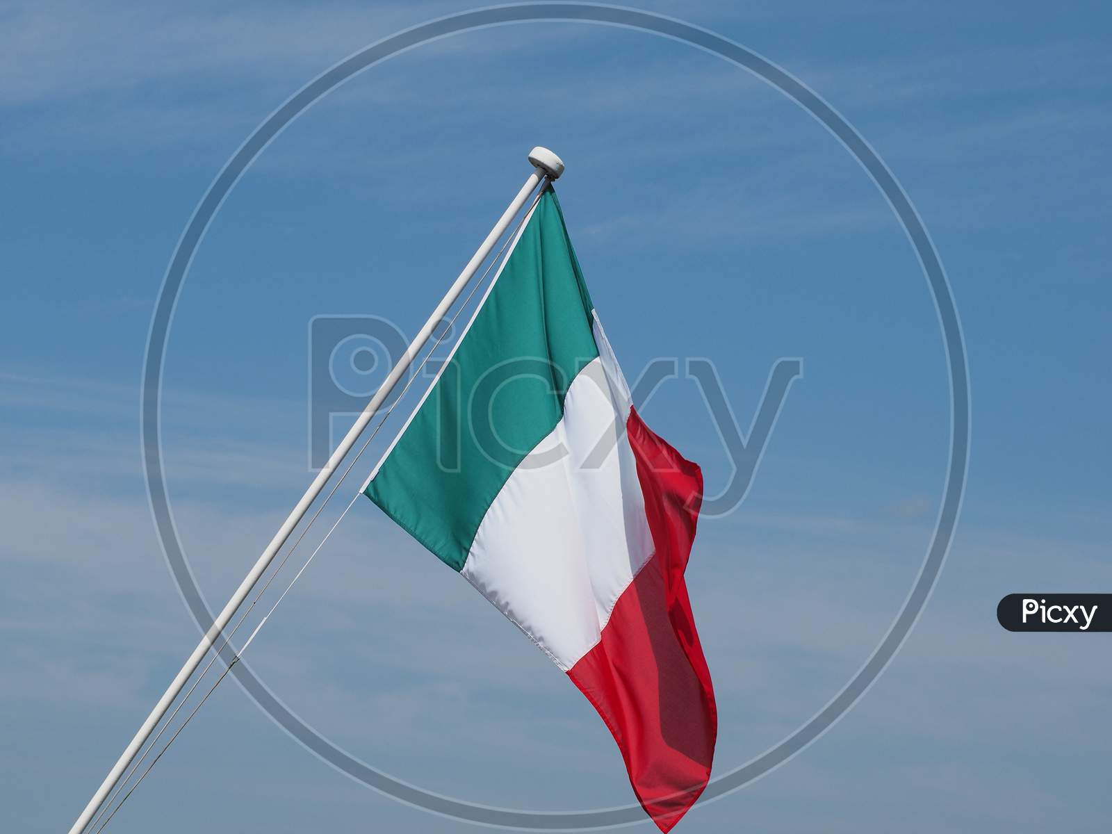 Italian Flag Of Italy Over Blue Sky