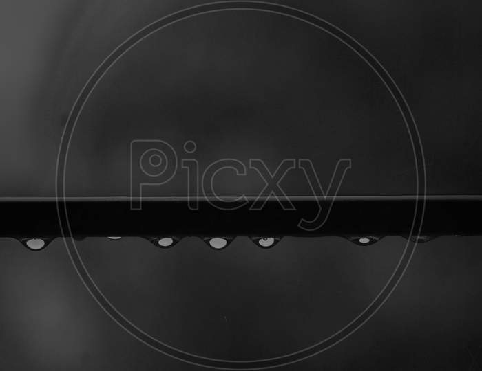 Rain Drops On Grill Window Close Up Rain Drop In The Rainy Season For Nature Feel Lonely Black & Withe Background