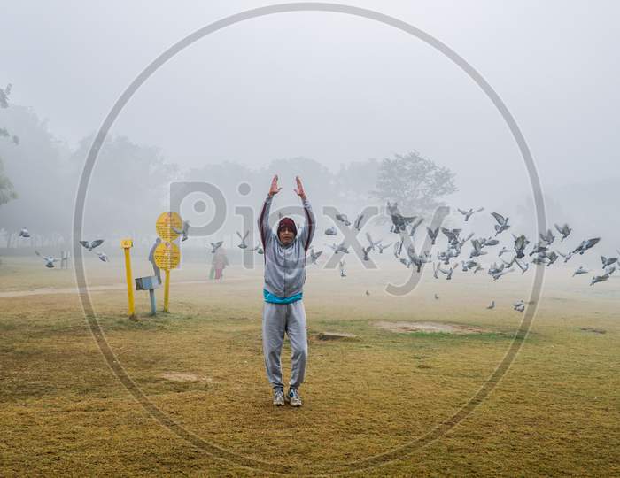 Man Doing Exercise in Park, New Delhi, India