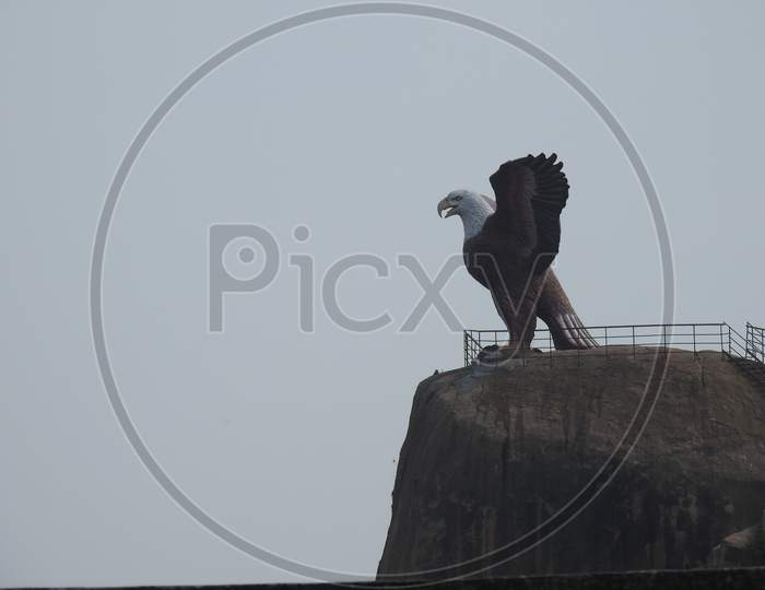 Closeup of beautiful attraction huge statue open wing Eagle or Jatayu Park at Lepakshi above the rock