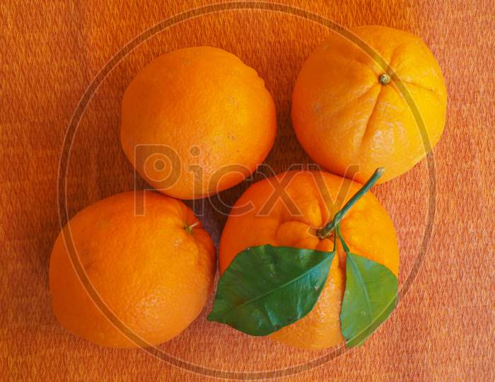 Orange Fruit With Leaves