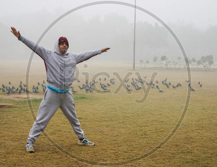 Man Doing Exercise in Park, New Delhi, India