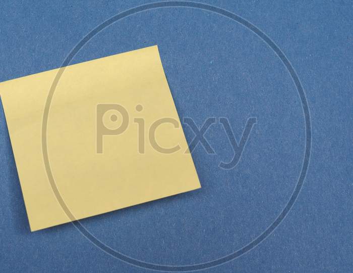 Postit Over Blue With Copy Space